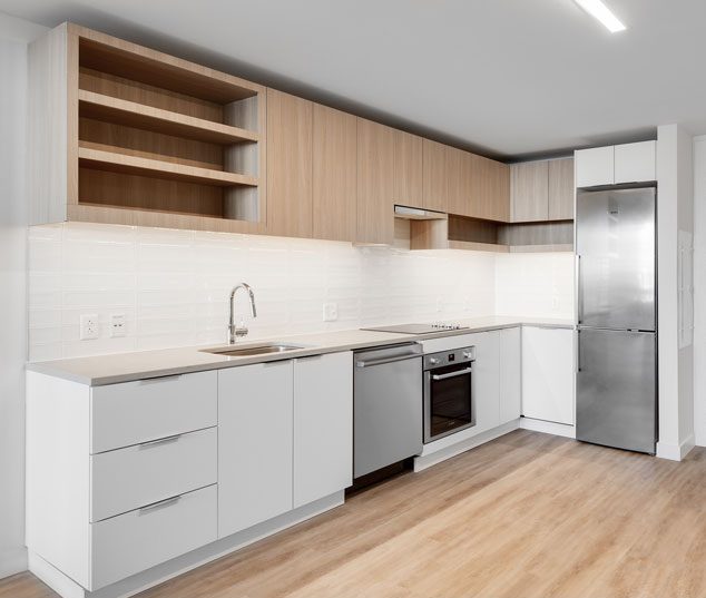 Thumbnail of white kitchen with light wood cabinets